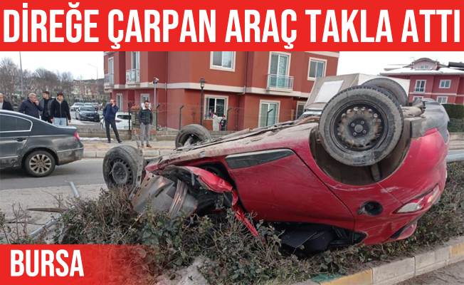 İnegöl'de aydınlatma direğine çarpan otomobil takla attı