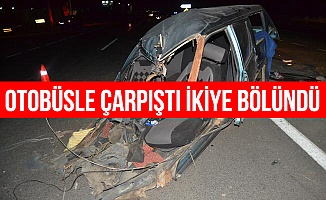 Yolcu otobüsüyle çarpışan otomobil ikiye bölündü