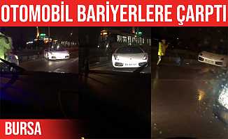 Bursa'da lüks otomobil bariyerlere çarptı